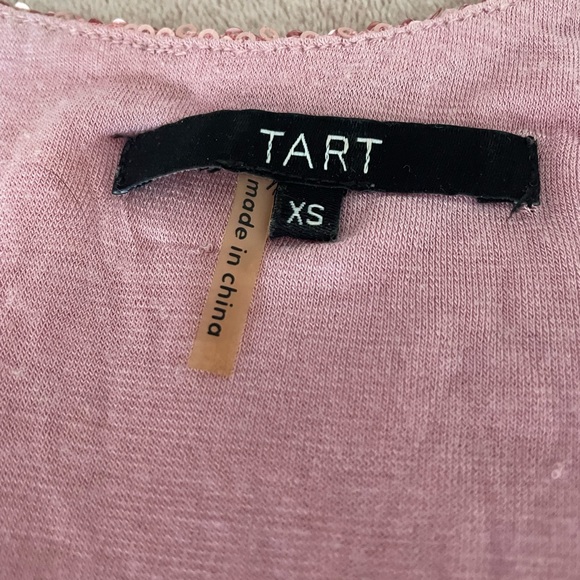 Shiny babydoll shirt. Stunning with a pair of heels and jeans. - Picture 10 of 15